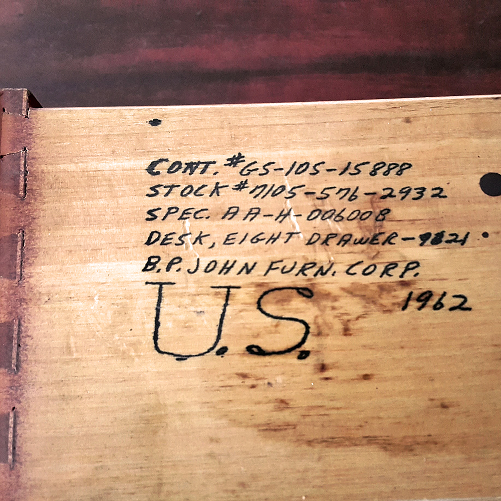 Handwriting on the side of one of the drawers